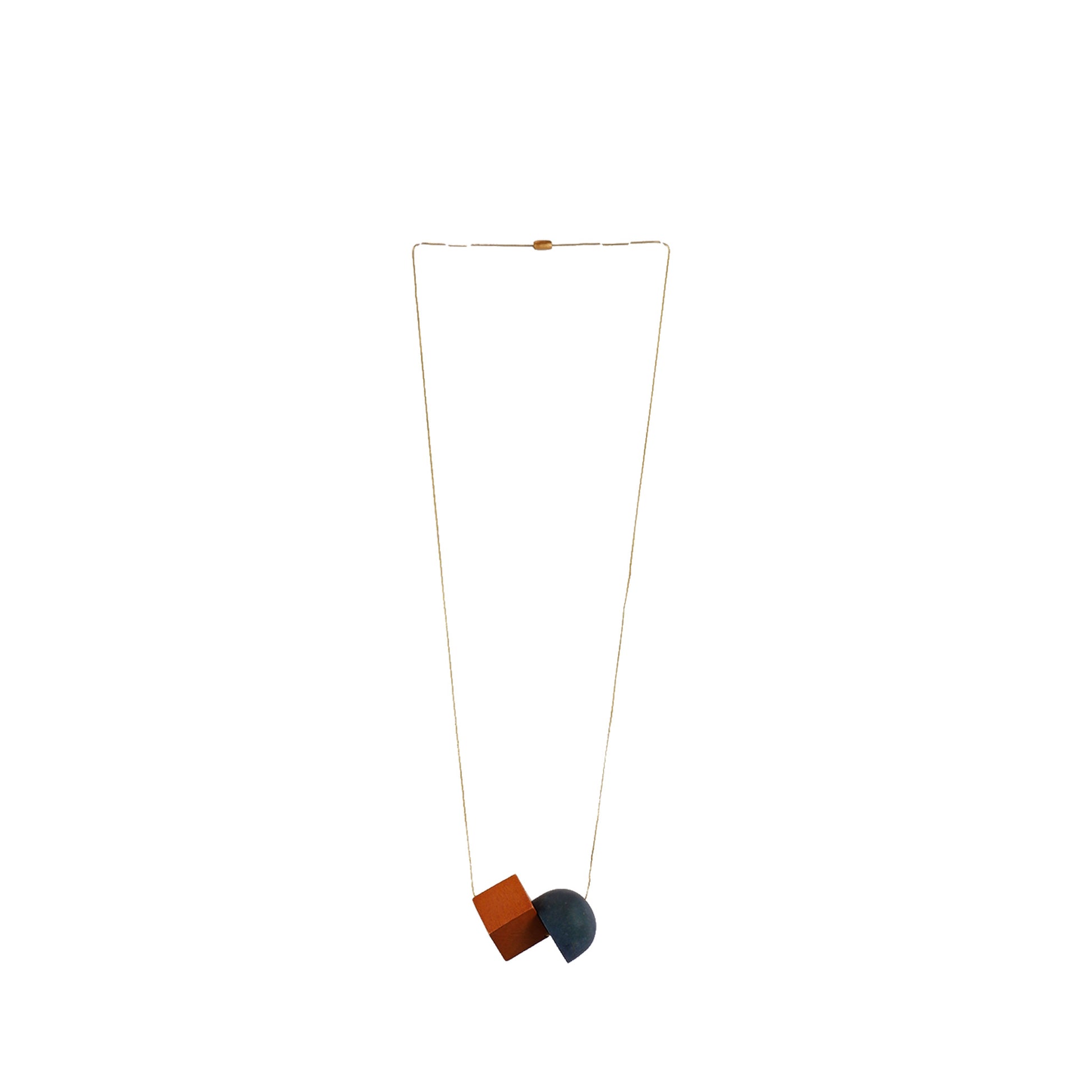 Handmade wooden necklace featuring a brown cube and dome pendant. A unique, eco-friendly, artisan-crafted geometric jewelry piece with a modern aesthetic.