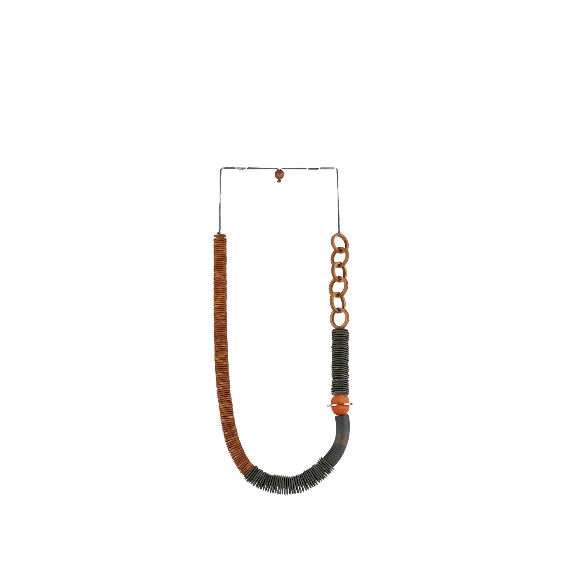 Handmade brown wooden necklace featuring flat wooden discs and a metal accent. A unique, eco-friendly, artisan-crafted jewelry piece with a modern touch.

