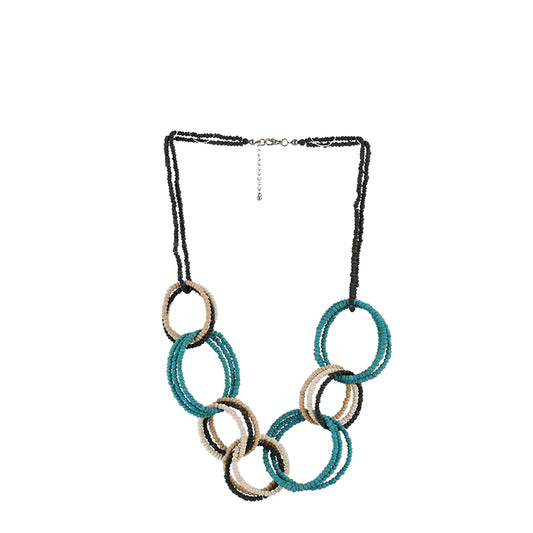 Handmade wooden necklace with interlaced round links, crafted by a sustainable fashion accessories manufacturer. Unique, eco-friendly, and timeless.
