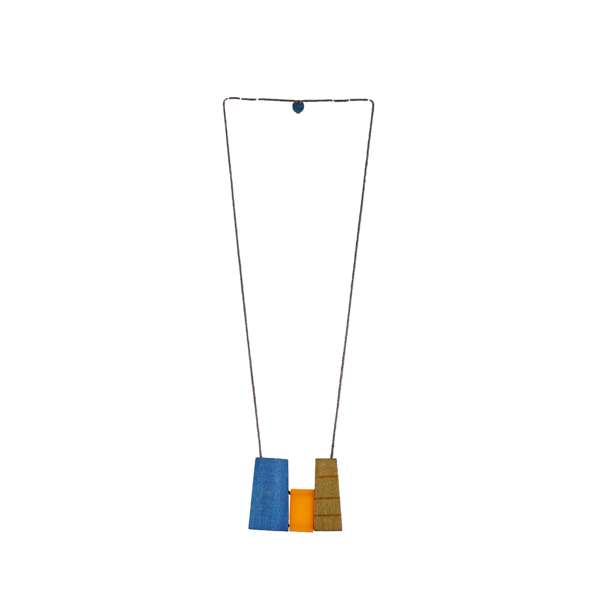 handmade wooden necklace featuring an irregular rectangle-shaped pendant in blue. A unique, eco-friendly, artisan-crafted statement jewelry piece.