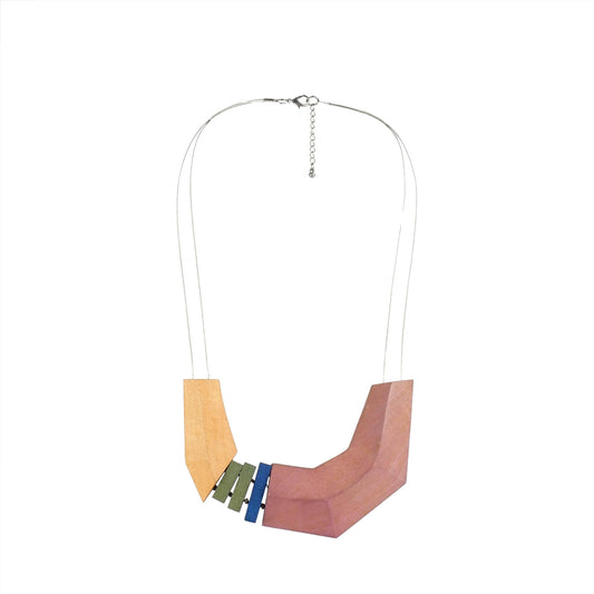 Handmade wooden necklace with a pink geometric pendant. Ethically crafted, lightweight, and designed for minimalist and boho-chic fashion lovers.